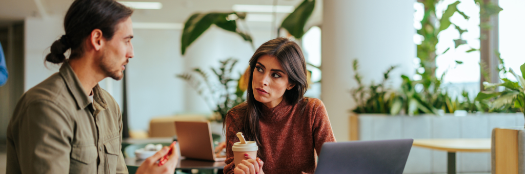 Woman receiving feedback from boss. 