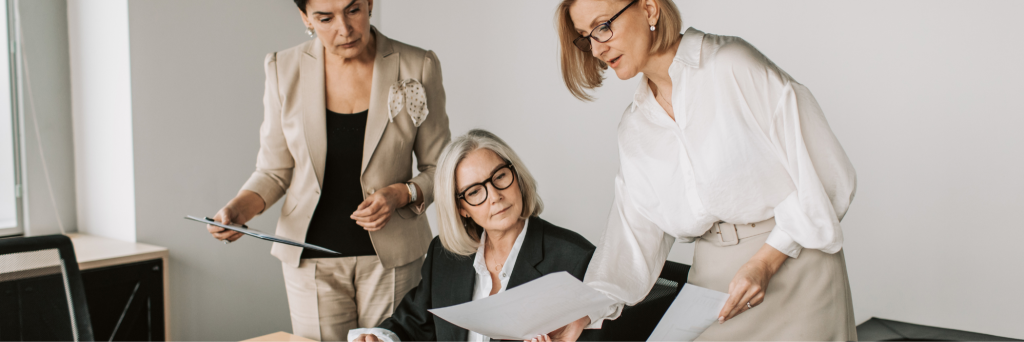 Female leader listening to colleagues